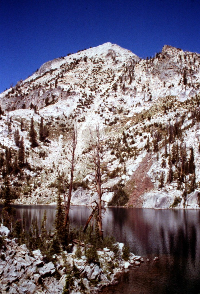 The east face of Mount Everly rising up above Everly Lake. The standard route climbs u