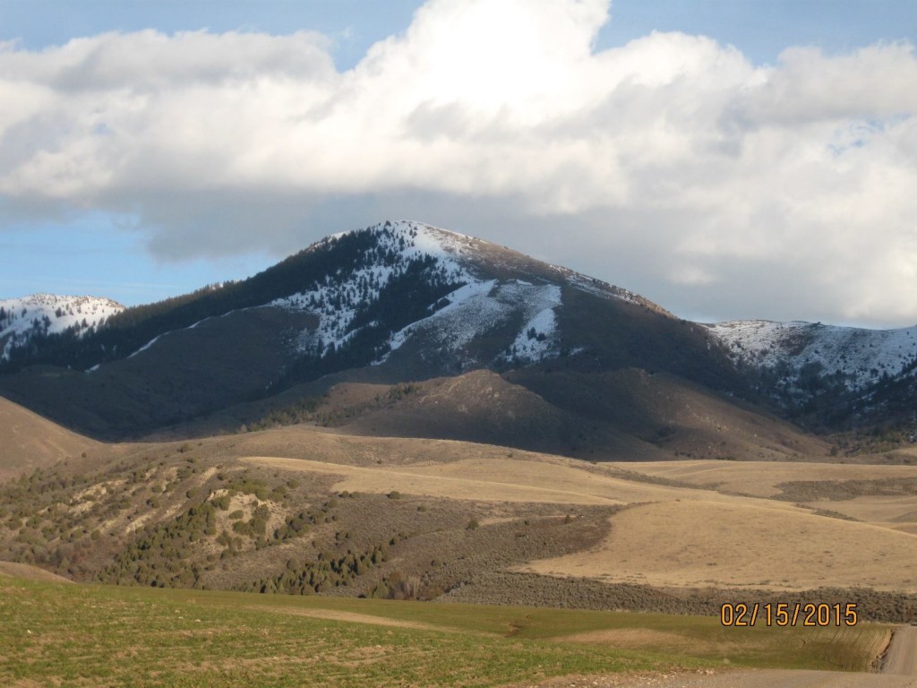 Cottonwood Peak in the southern Portneuf Range from the old pioneer Grant Ward cemetery east of Downey Idaho. Russ Durant Photo